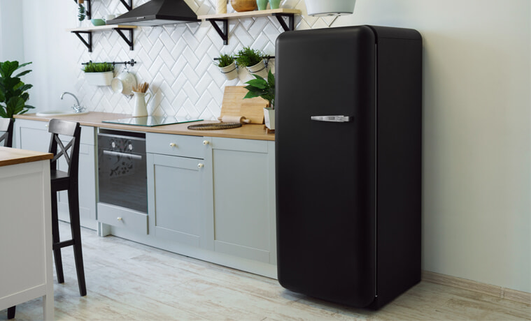 White kitchen with black shop fridge